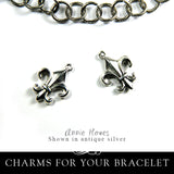 Fleur de Lis Charm. Nunn Design.