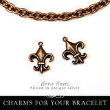 Fleur de Lis Charm. Nunn Design.