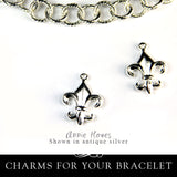Fleur de Lis Charm. Nunn Design.