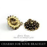 Mumm Flower Charm. Nunn Design